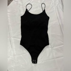 Never worn body suit